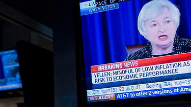 Janet Yellen, then chair of the Federal Reserve, on television monitors at the New York Stock Exchange in June 2014. Photo: Jin Lee/Bloomberg via Getty Images.