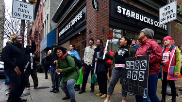 Protests sparked by the arrest of two Black men at a Starbucks location in Philadelphia in April 2018. Photo: Bastiaan Slabbers/NurPhoto via Getty Images.