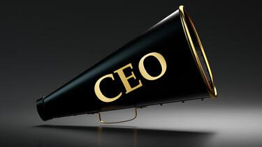 A black megaphone labeled "CEO" in gold