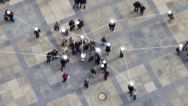 A crowd seen from above with network nodes indicated