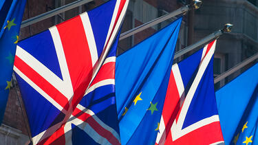 The flags of the UK and the EU