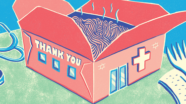 A takeout box decorated to look like a hospital, with the text "thank you"