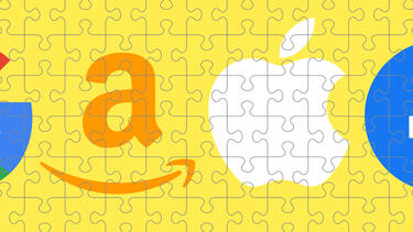 A jigsaw puzzle with the logos of Amazon, Apple, Google, and Facebook