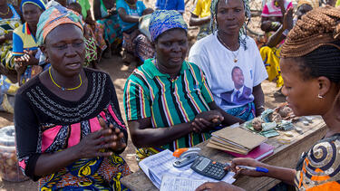 A microfinance meeting in Northern Togo. Photo: Godong/UIG via Getty Images.