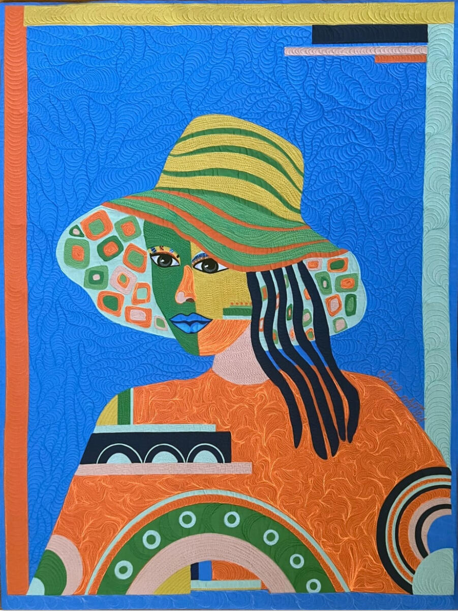A portrait of a woman wearing a hat