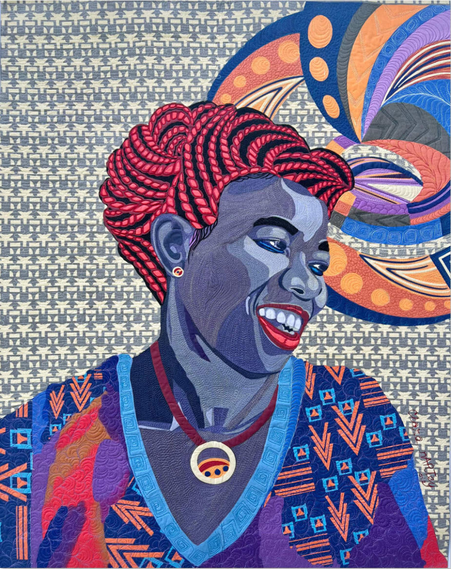 A portrait of a laughing woman
