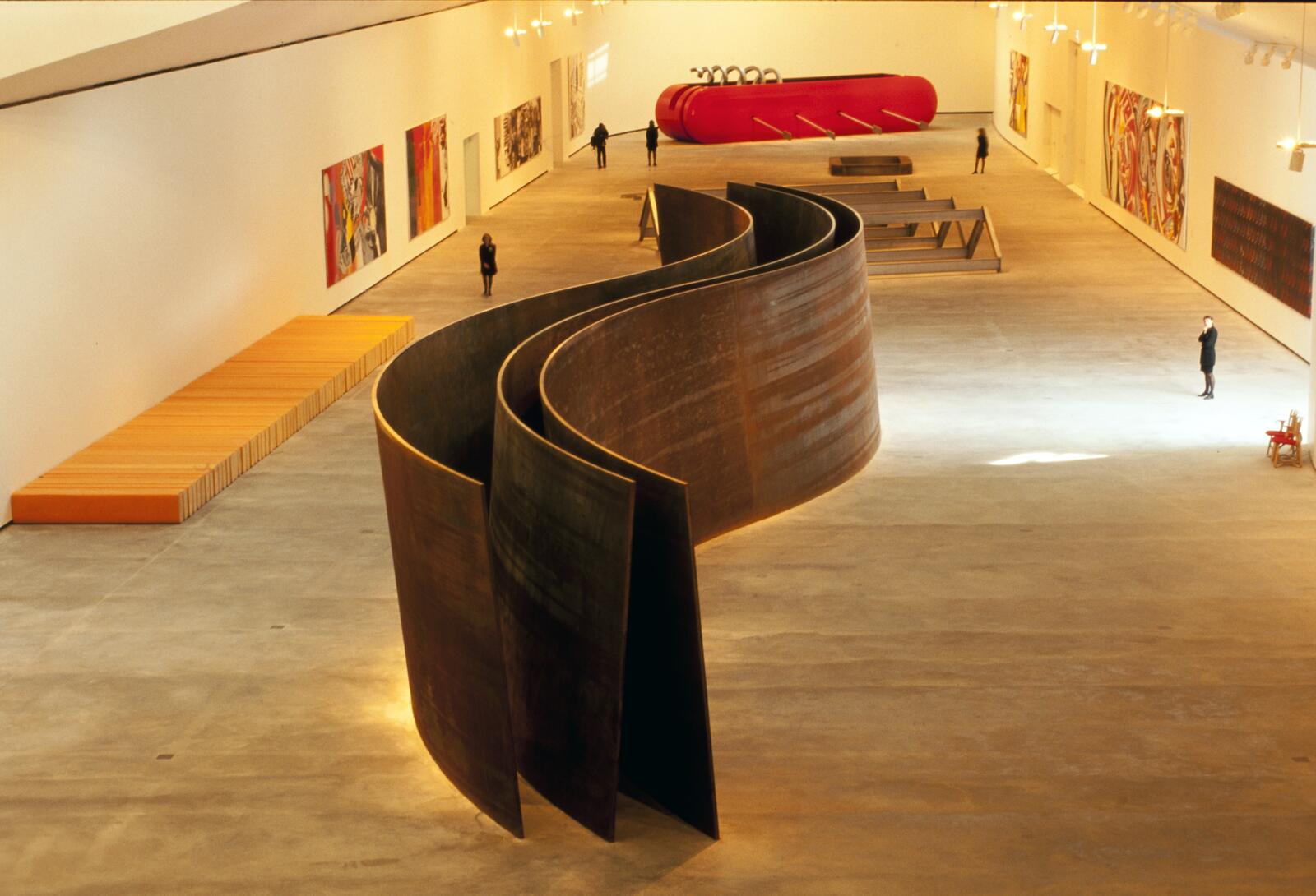 A large-scale Richard Serra sculpture in a gallery at the Guggenheim Bilbao