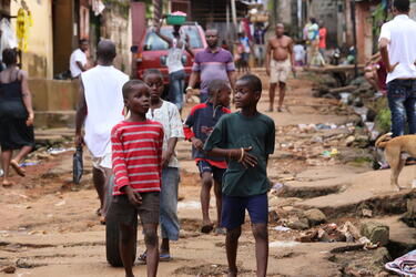 Boys walking home in their neighborhood of Freetown, Sierra Leone