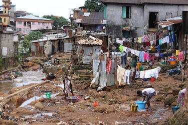A neighborhood in Freetown, Sierra Leone. Many people had to evacuate after torrential rain caused the river to flood.