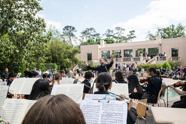 Daily life in Houston, young musicians performing outdoor concert
