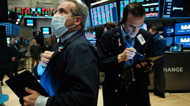 A trader wearing a mask on the floor of the New York Stock Exchange on March 20, 2020. Photo: Spencer Platt/Getty Images.