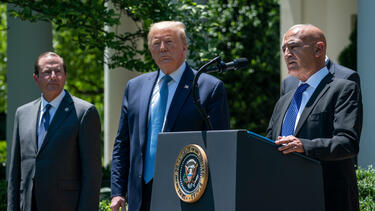 Moncef Slaoui, lead scientist on Operation Warp Speed, with President Trump and Health and Human Services Secretary Alex Azar at a press conference on vaccine development in May 2020. Photo: Drew Angerer/Getty Images.