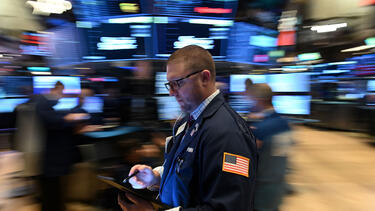 A trader at the New York Stock Exchange on February 28, 2020. Photo: Johannes Eisele/AFP via Getty Images.