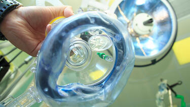 An anesthesia mask from the point of view of a patient in surgery