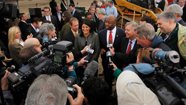 Senator Tim Scott, Republican of South Carolina, speaking to the media with Governor Nikki Haley and Senator Lindsey Graham at a 2013 groundbreaking event. Photo: Gerry Melendez/The State/Tribune News Service via Getty Images.