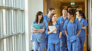 Medical students in the hallway of a hosptial