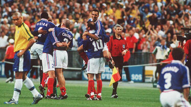 The French team celebrates after winning the World Cup final on July 12, 1998. 