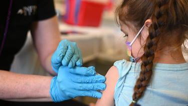 A child receiving a vaccine