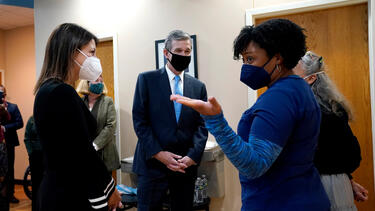 Dr. Mandy Cohen (left) and Governor Roy Cooper of North Carolina tour a Chapel Hill hospital in November 2021.
