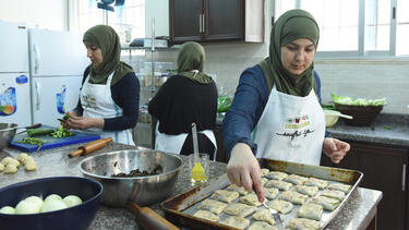 Women cooking in the documentary Soufra.
