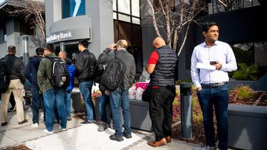 Customers outside the  headquarters of the Silicon Valley Bank on March 13.