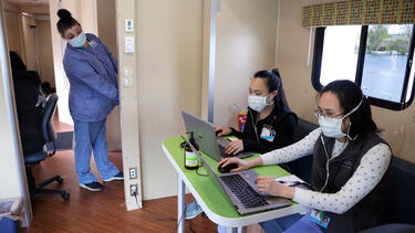 Staff at a mobile clinic in Seattle in April 2020. 