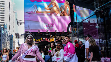 Fans in New York’s Times Square wearing Barbie clothes for the opening of Barbie movie on July 21, 2023.