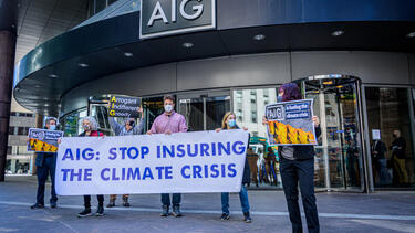 Climate protesters outside AIG headquarters in Manhattan in 2021.