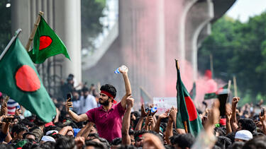 Anti-government protesters in Dhaka on August 5, after Prime Minister Sheikh Hasina resigned from office.  