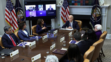 Joe Biden and Kamala Harris with the Investing in America Cabinet at the White House in May 2023 .