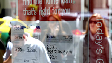 Mortgage rates in the window of a Bank of America office