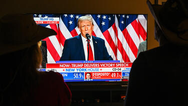 Voters in Foster City, California, watch election-night coverage. 