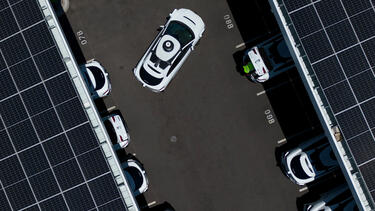 A parking lot full of self-driving taxis