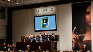 The auction of Leonardo da Vinci’s Salvator Mundi at Christie’s in 1997.