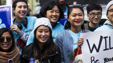 Demonstrators supporting Harvard University’s admission process at a protest in October 2018. Photo: Adam Glanzman/Bloomberg via Getty Images.