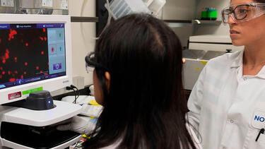 Dr. Sonia Macieiewski and Dr. Nita Patel at a Novavax lab in Rockville, Maryland, on March 20. Photo: Andrew Caballero-Reynolds/AFP via Getty Images.