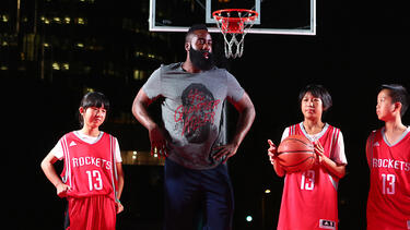 Houston Rockets star James Harden with young fans during a visit to China in 2016. 