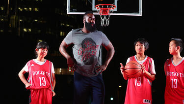 Houston Rockets star James Harden with young fans during a visit to China in 2016.