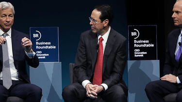 Jamie Dimon of JPMorgan Chase, the chair of the Business Roundtable,  with Randall Stephenson of AT&T and Dennis Muilenburg of Boeing at a 2018 event hosted by the group. Photo: Mark Wilson/Getty Images.