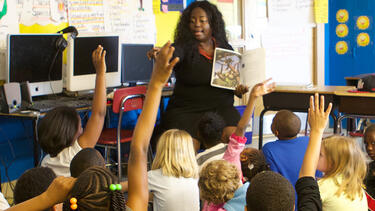 A teacher in a classroom.