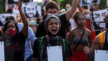 Demonstrators march in St. Anthony, Minnesota, on July 6, 2020, the fourth anniversary of the murder of Philando Castile. Photo: Stephen Maturen/Getty Images.