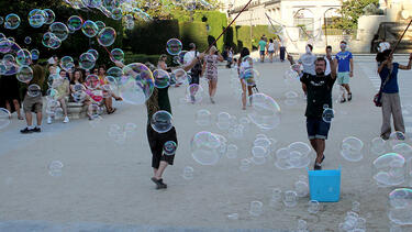 Children playing with bubbles