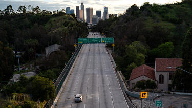 An empty Interstate 110 at rush hour in Los Angeles on April 10, 2020. Kent Nishimura / Los Angeles Times via Getty Images.