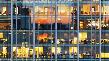 An office building with an illuminated interior