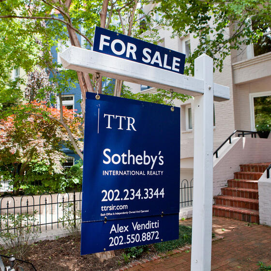 A for sale sign outside a house