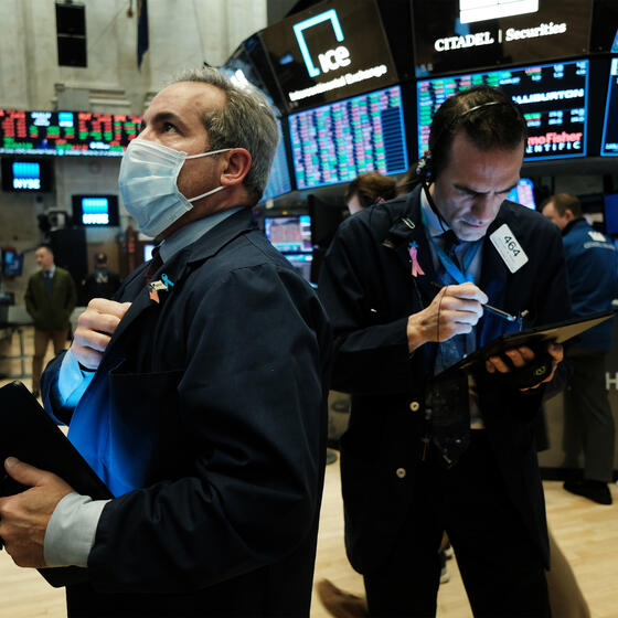 A trader wearing a mask on the floor of the New York Stock Exchange on March 20, 2020. Photo: Spencer Platt/Getty Images.
