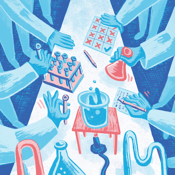Scientists gathered around a lab table working with test tubes in concert.