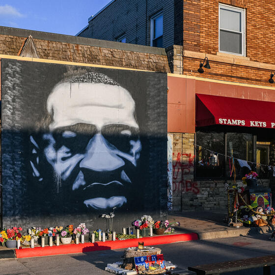 A mural of George Floyd at George Floyd Square in Minneapolis, where Floyd was murdered in June 2020. Photo by Brandon Bell/Getty Images.