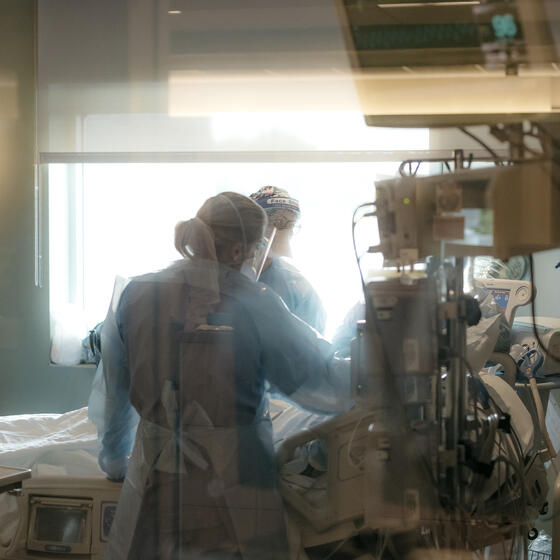 Nurses with a COVID-19 patient in the intensive care unit at NEA Baptist Memorial Hospital in Jonesboro, Arkansas, in August 2021.