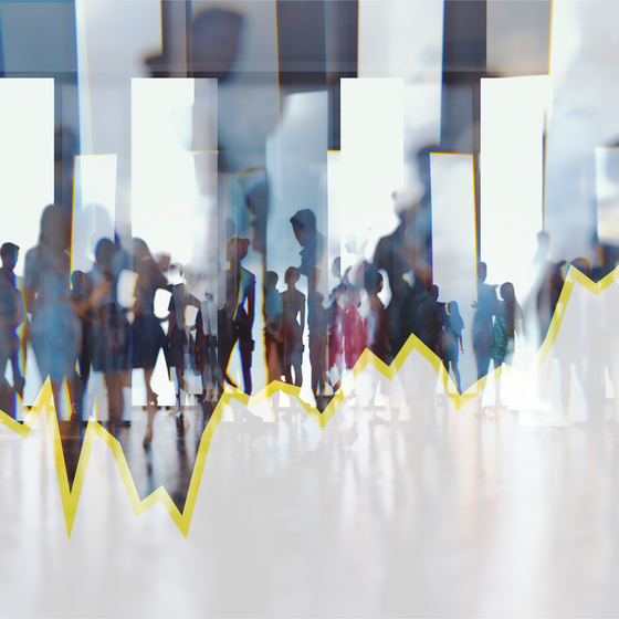 An abstract image of a crowded corporate lobby overlayed by a stock chart